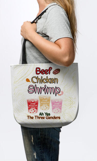 BCS White Tote a person holding a white tote with black strap and on it, it says, "beef, chicken, shrimp ah yes the three genders." The tone is sily and the colors of the cup of noodles and text are red, yellow, and pink, corresponding to ramen noodle packaging and flavo